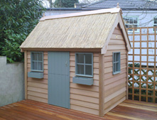 Cedar cottage with reed roof